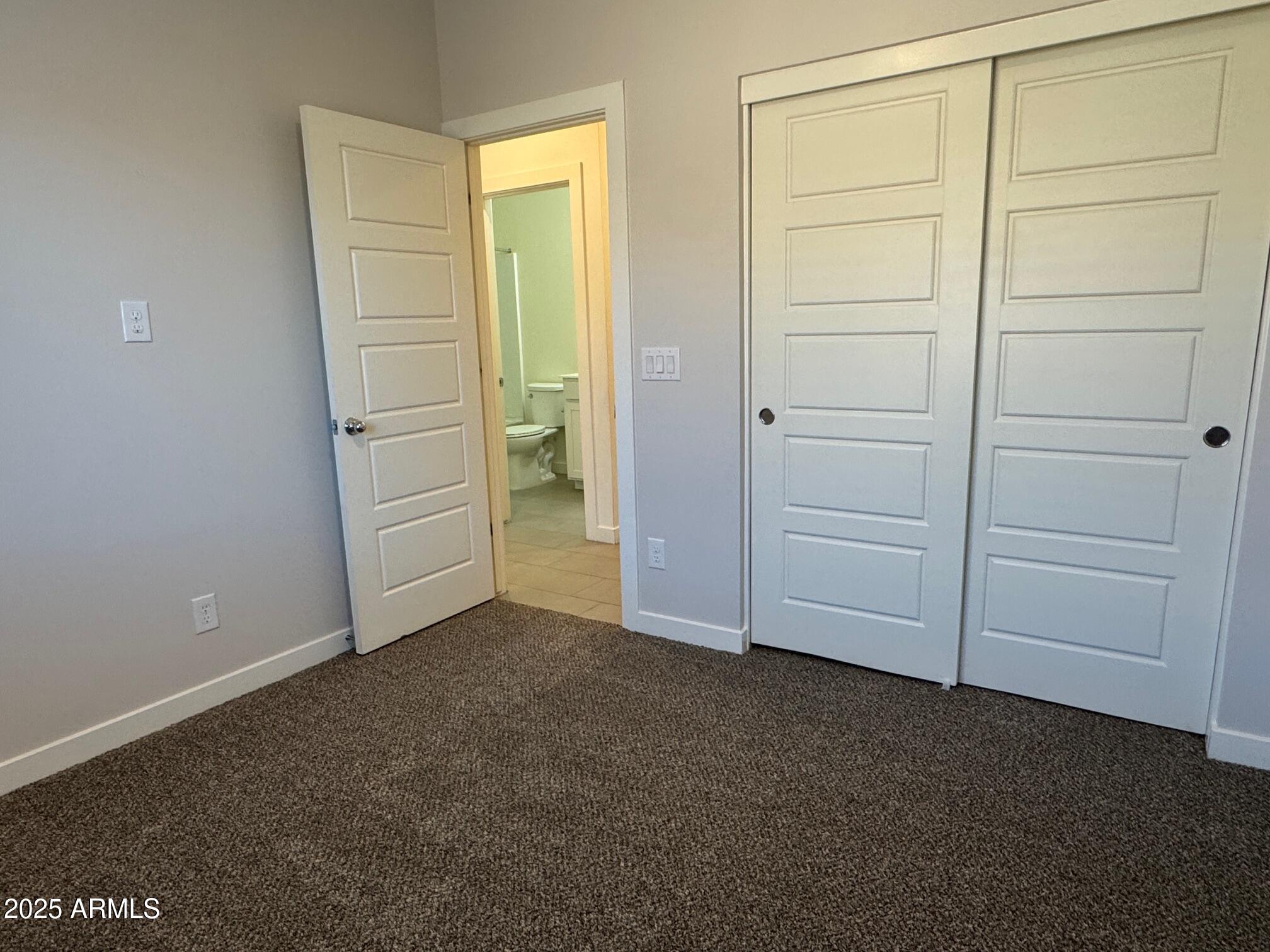 724 East Ruby Drive Casa Grande, AZ 85122 - Photo 7 of 20 an empty room with closet area