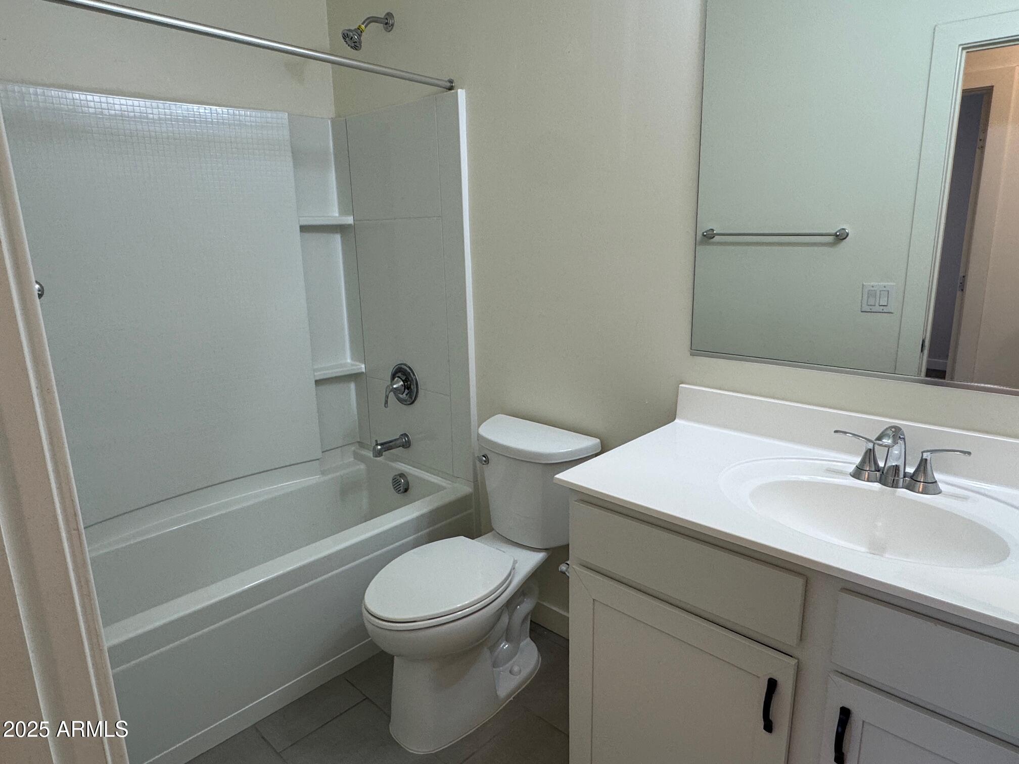724 East Ruby Drive Casa Grande, AZ 85122 - Photo 8 of 20 a bathroom with a sink a toilet and a bathtub