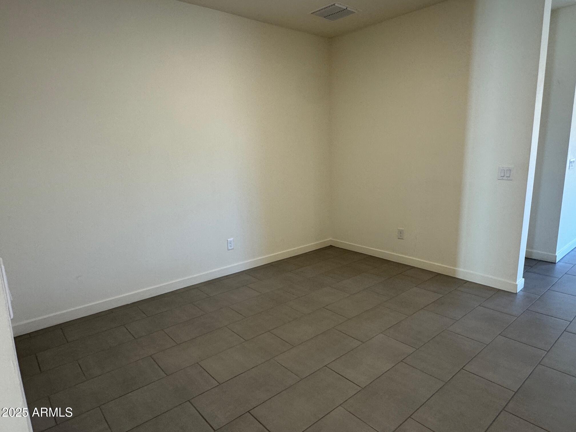 724 East Ruby Drive Casa Grande, AZ 85122 - Photo 10 of 20 an empty room and a window