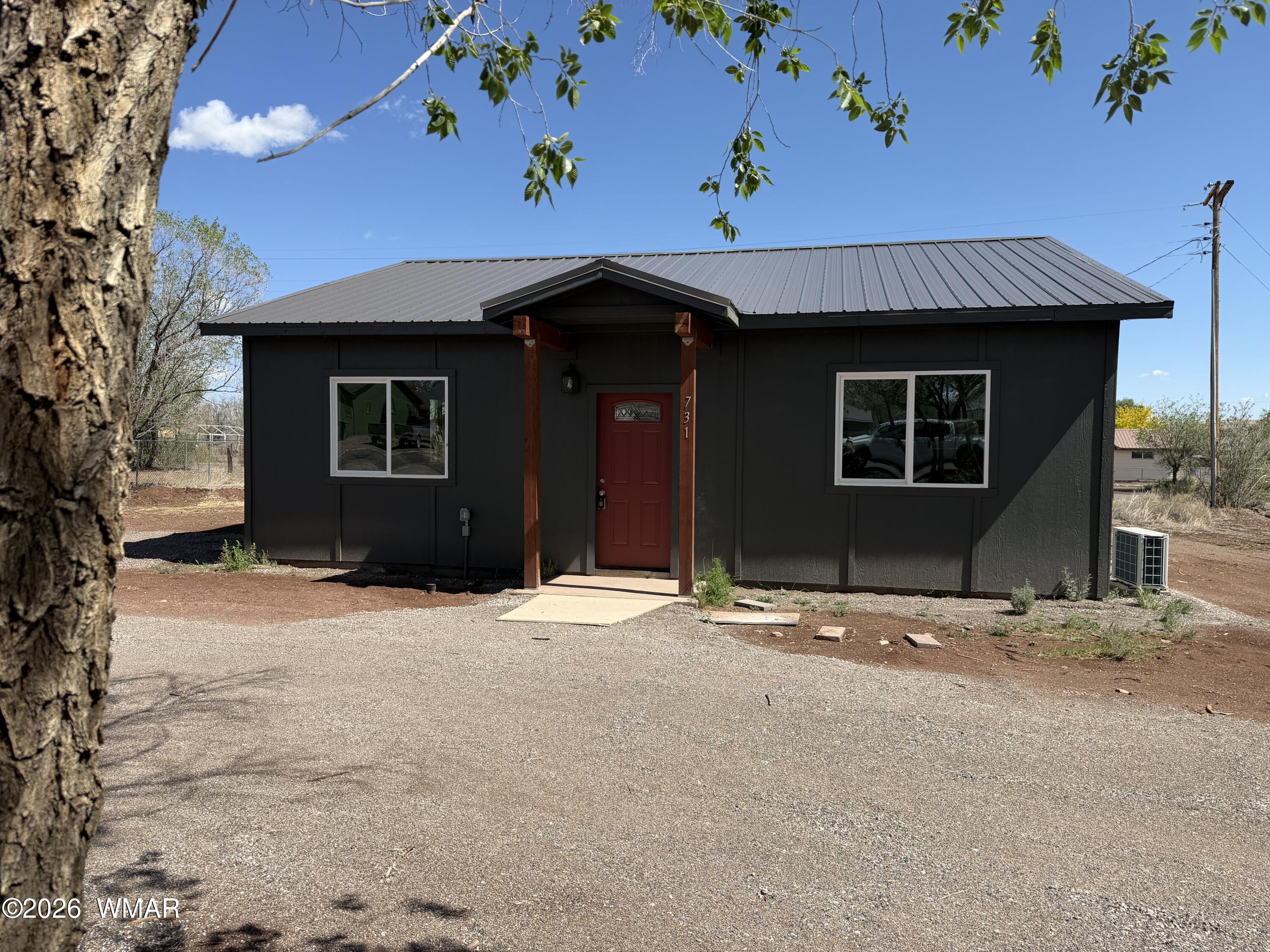 731 Tori Circle Springerville, AZ 85938 - Photo 1 of 19 a front view of a house with a yard
