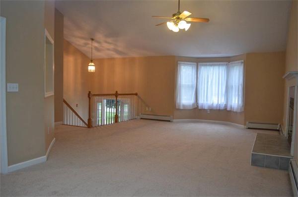 6 Clover Hill Road Sutton, MA 01590 - Photo 6 of 23 a view of empty room with a ceiling fan