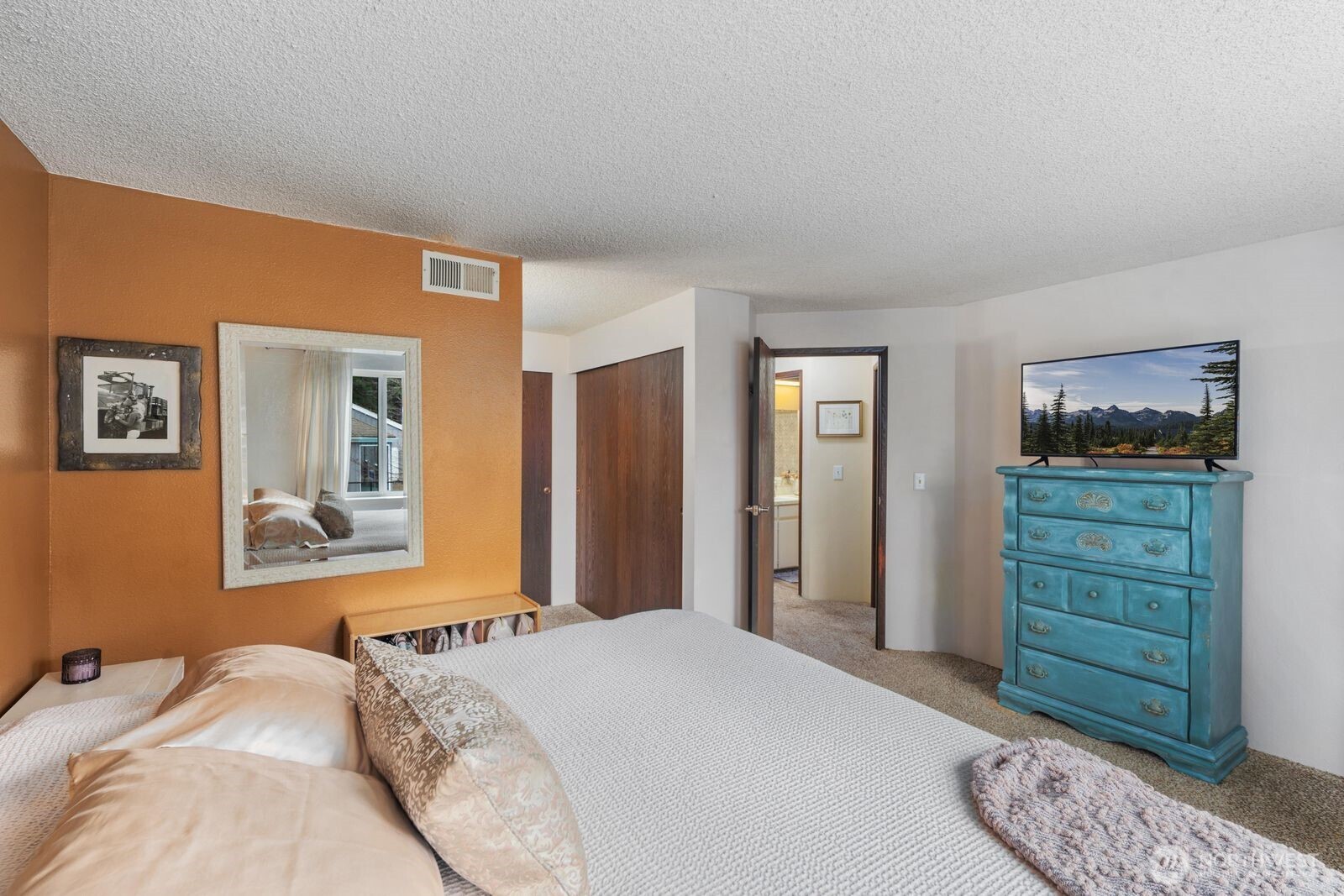 3114 Southwest 319th Place, Unit 45 Federal Way, WA 98023 - Photo 17 of 39 a bedroom with a bed and a dresser