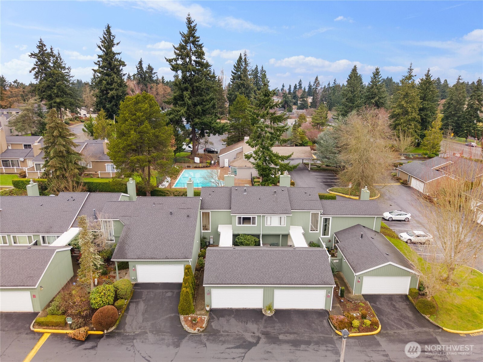 3114 Southwest 319th Place, Unit 45 Federal Way, WA 98023 - Photo 30 of 39 an aerial view of residential houses with outdoor space and parking
