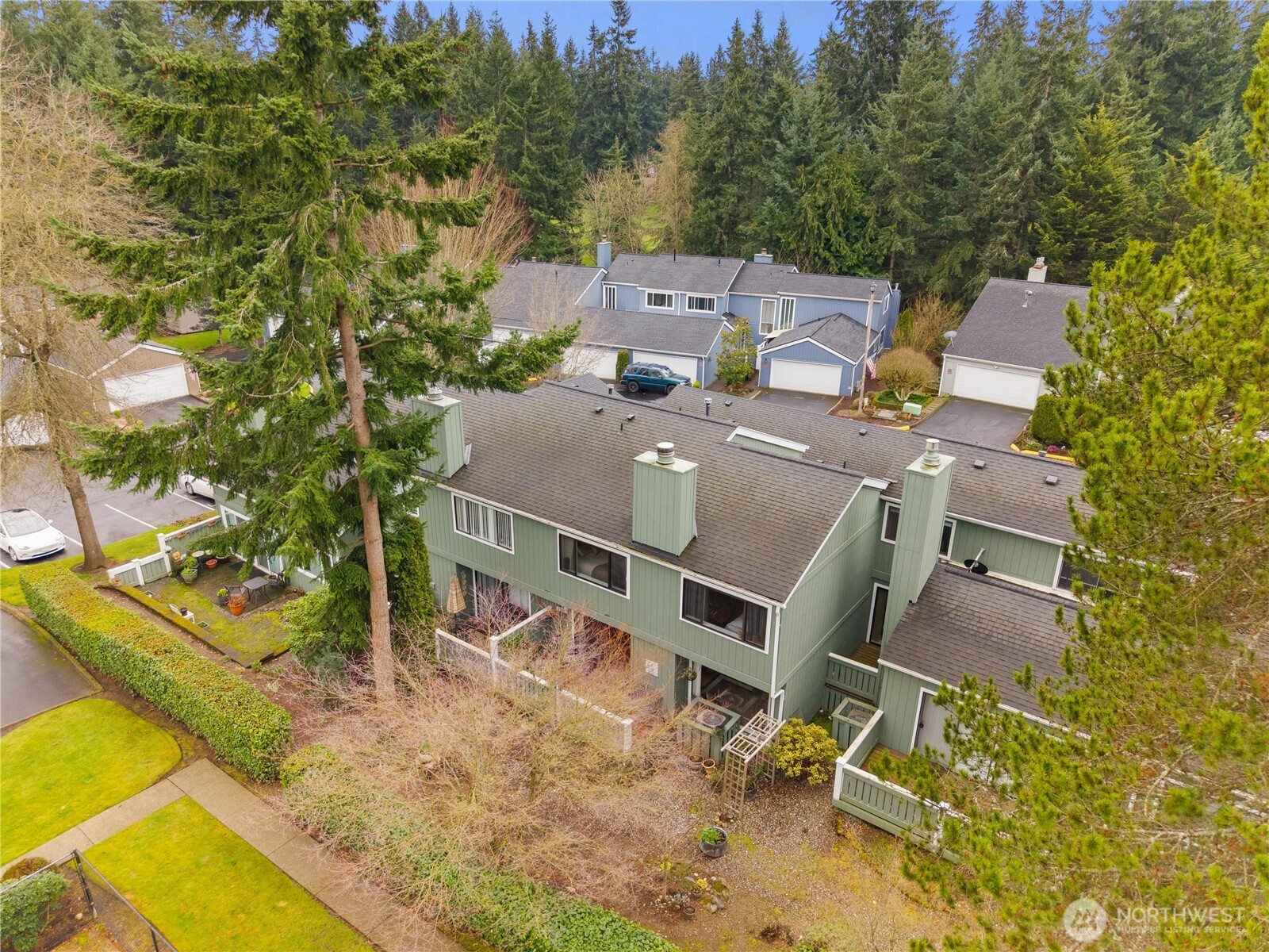 3114 Southwest 319th Place, Unit 45 Federal Way, WA 98023 - Photo 33 of 39 an aerial view of a yard with swimming pool