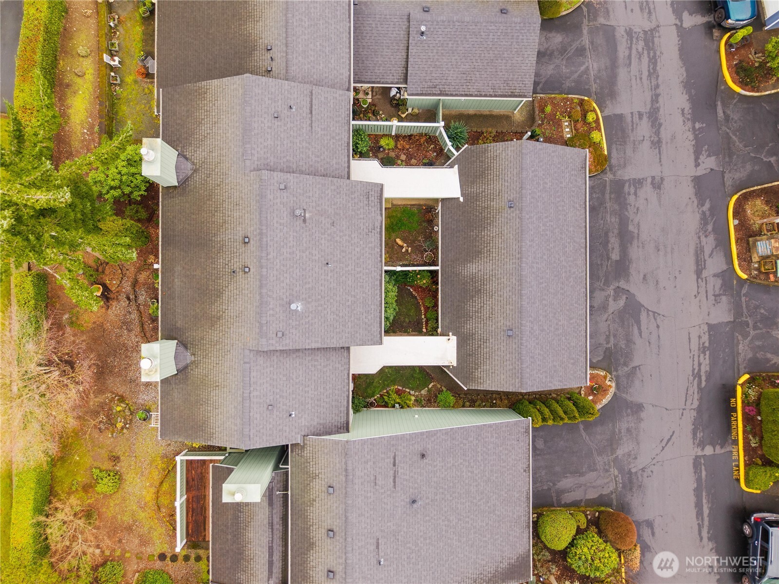 3114 Southwest 319th Place, Unit 45 Federal Way, WA 98023 - Photo 34 of 39 an aerial view of residential house with outdoor space and parking