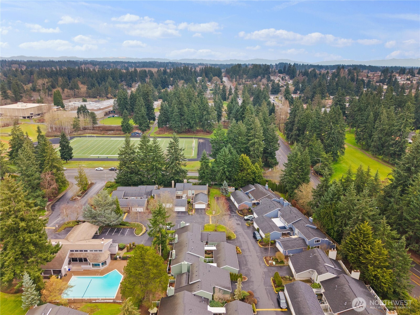 3114 Southwest 319th Place, Unit 45 Federal Way, WA 98023 - Photo 35 of 39 an aerial view of residential houses with outdoor space and lake view