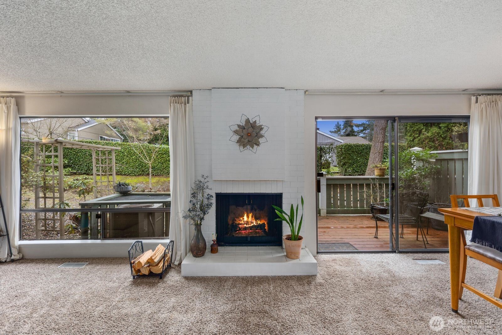 3114 Southwest 319th Place, Unit 45 Federal Way, WA 98023 - Photo 6 of 39 a living room with furniture and a fireplace