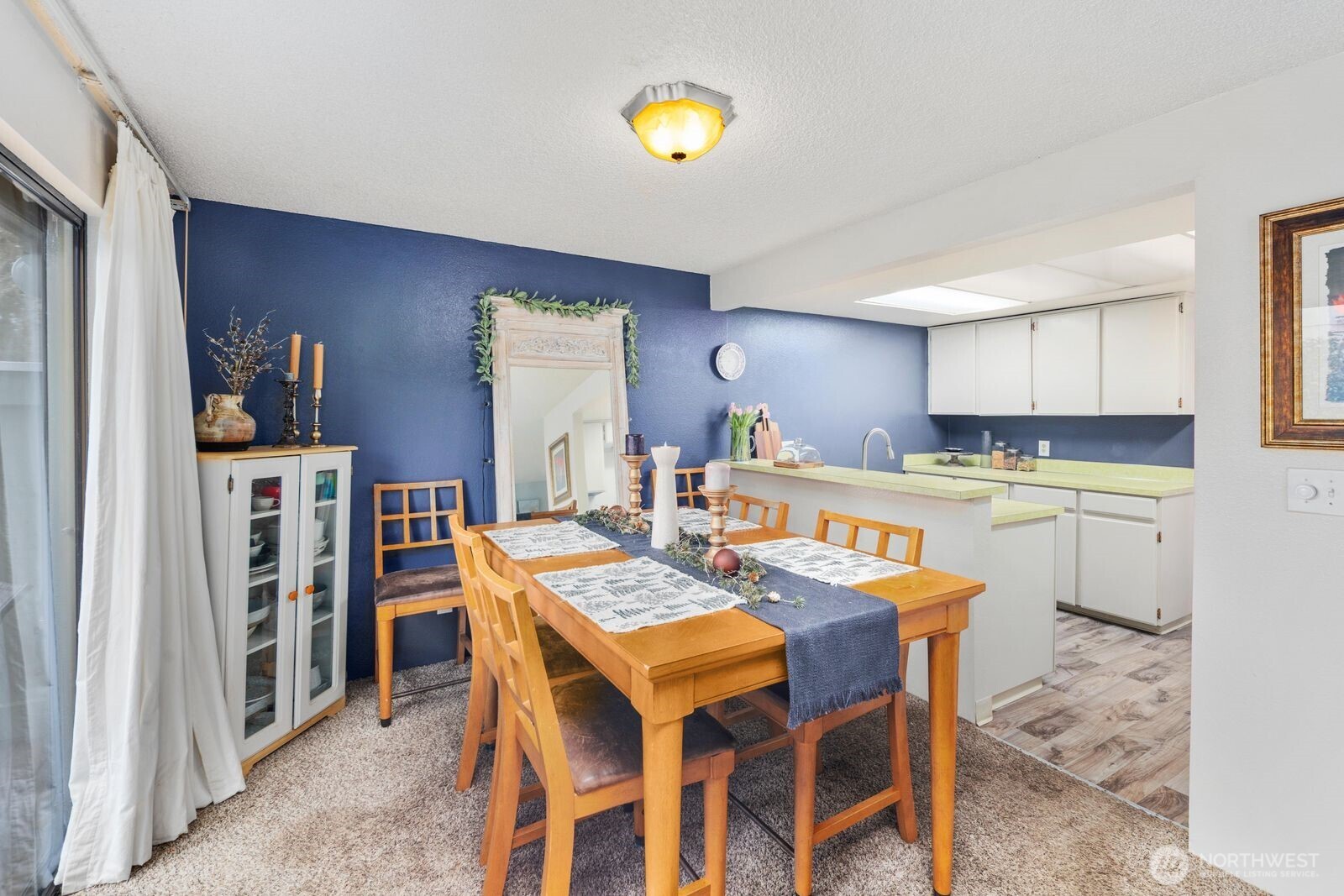 3114 Southwest 319th Place, Unit 45 Federal Way, WA 98023 - Photo 10 of 39 a view of a dining room with furniture