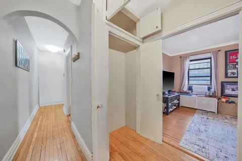 a view of a livingroom with furniture and a window
