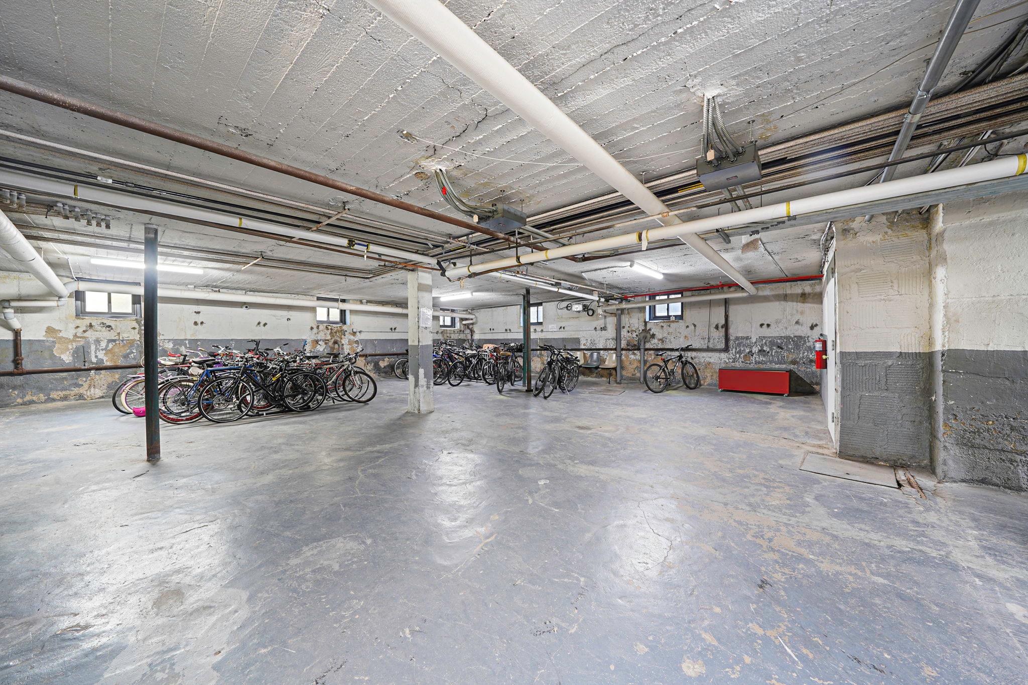 83-84 116th Street, Unit 1H Queens, NY 11418 - Photo 9 of 13 a view of parking garage