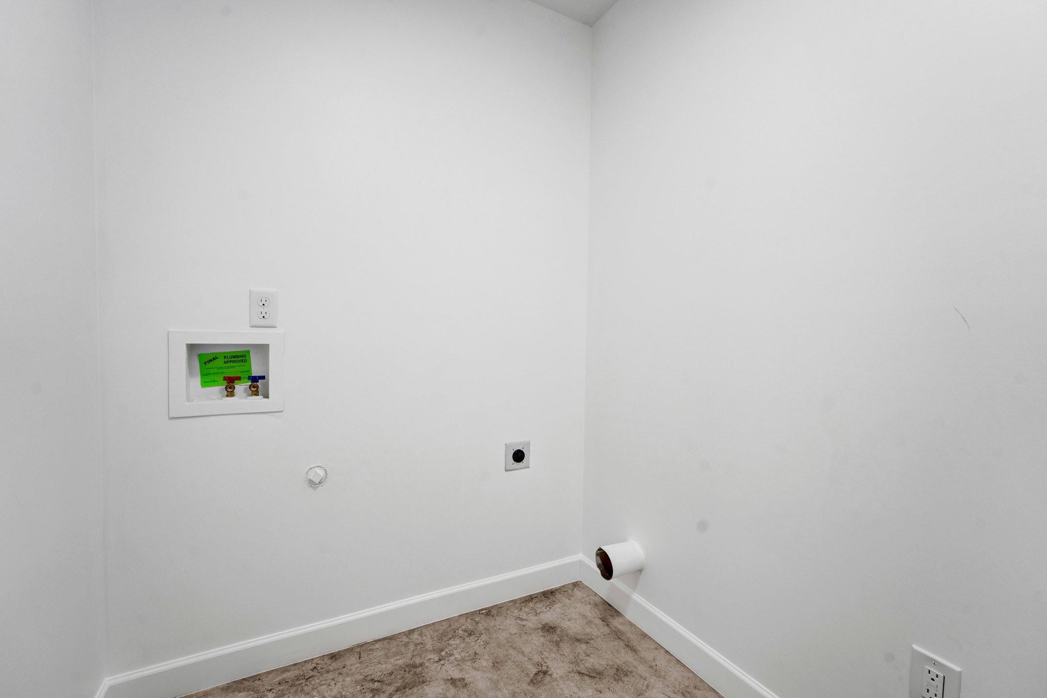 630 King Road Memphis, TN 38109 - Photo 20 of 27 Laundry area featuring washer hookup, light carpet, and hookup for an electric dryer