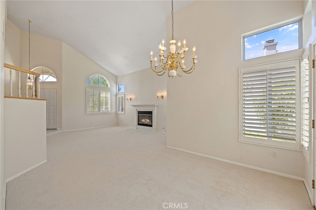 28974 Clear Spring Lane Highland, CA 92346 - Photo 13 of 65 Formal dining room, living room - fireplace is digitally enhanced