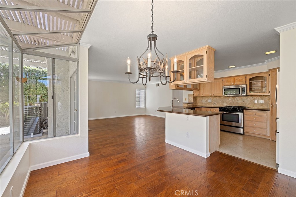 28974 Clear Spring Lane Highland, CA 92346 - Photo 15 of 65 kitchen opens to the family room