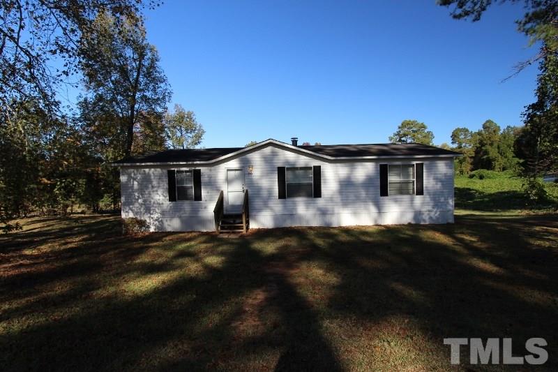 350 Big Pine Road Clayton, NC 27520 - Photo 1 of 20 a view of a house with a garden