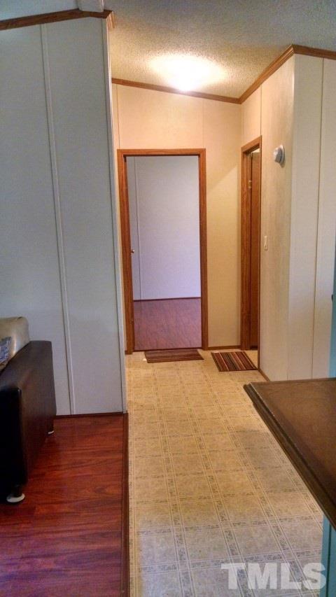 350 Big Pine Road Clayton, NC 27520 - Photo 15 of 20 an empty room with wooden floor and closet
