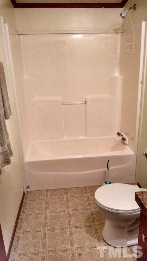350 Big Pine Road Clayton, NC 27520 - Photo 17 of 20 a bathroom with a toilet and a shower