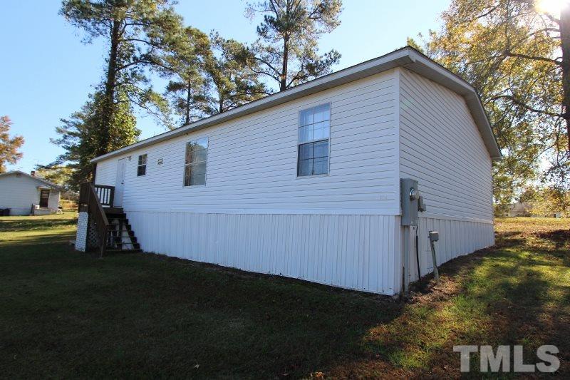 350 Big Pine Road Clayton, NC 27520 - Photo 19 of 20 a view of a back yard of the house