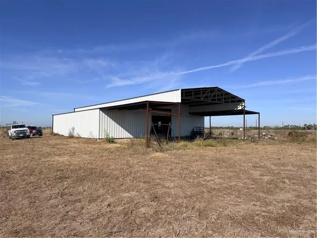 a view of a car in front of a house