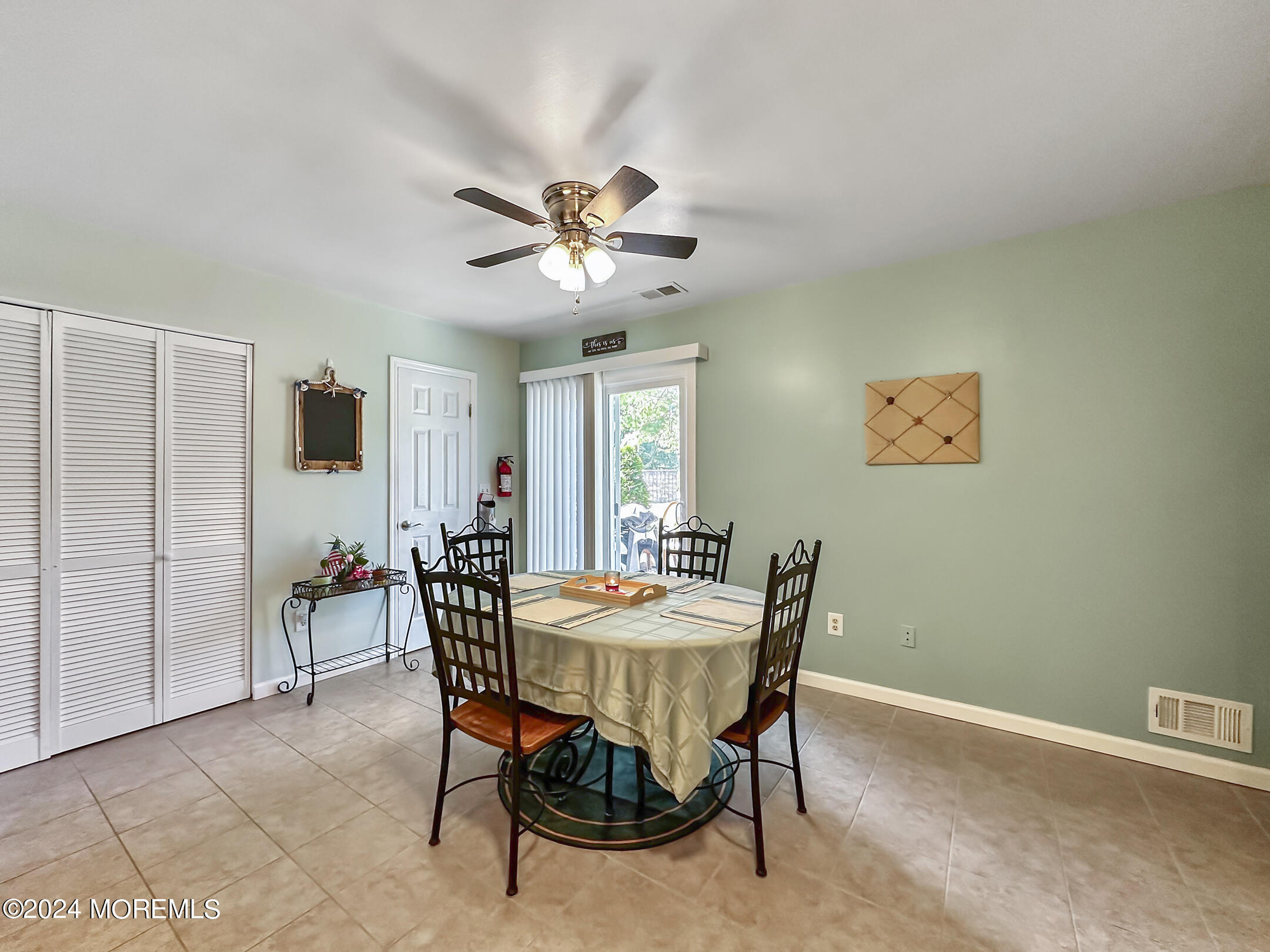 1002 Sawmill Road Brick, NJ 08724 - Photo 12 of 27 a dining room with furniture and window