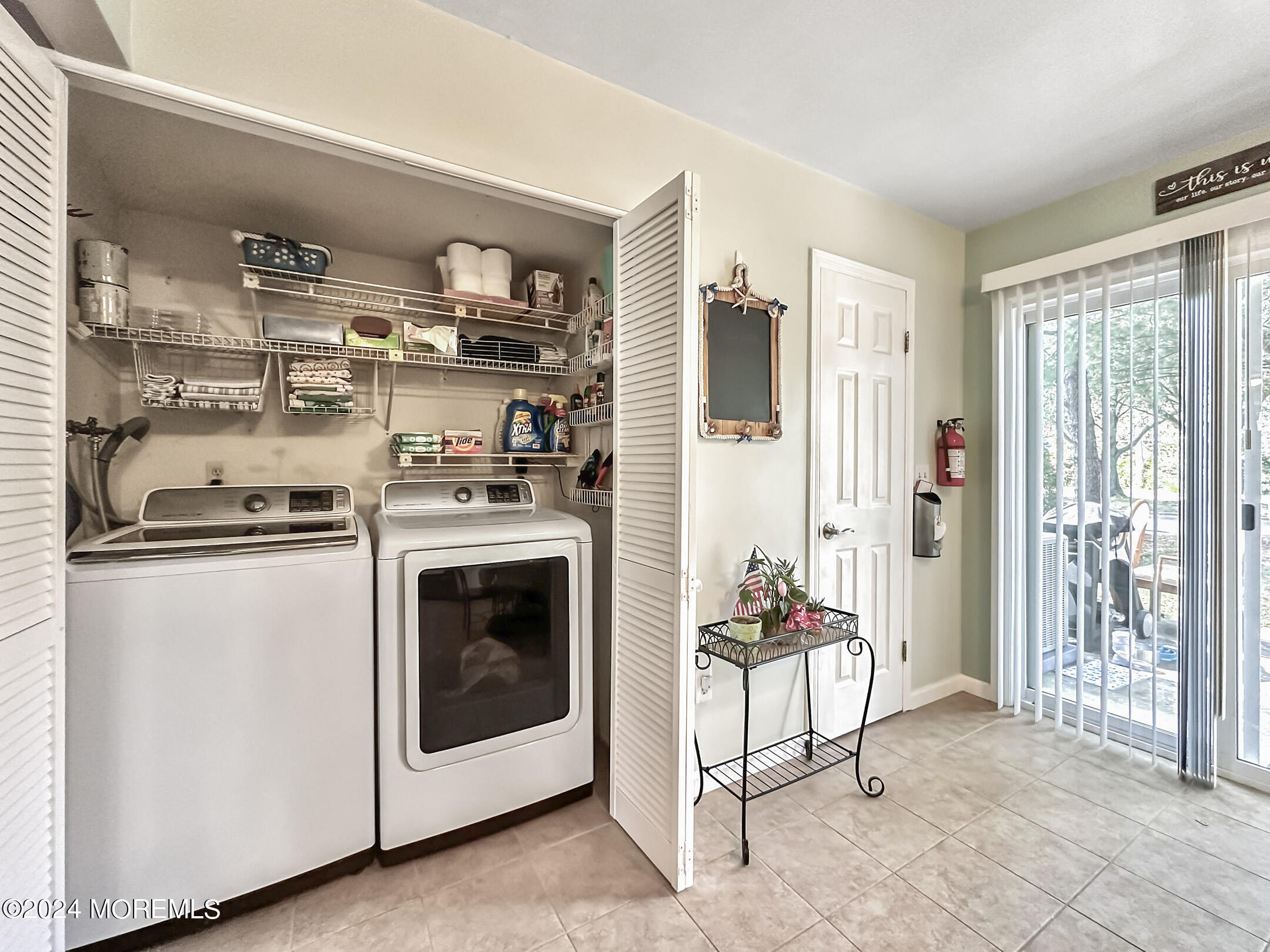 1002 Sawmill Road Brick, NJ 08724 - Photo 13 of 27 a kitchen with stainless steel appliances granite countertop a refrigerator and a stove