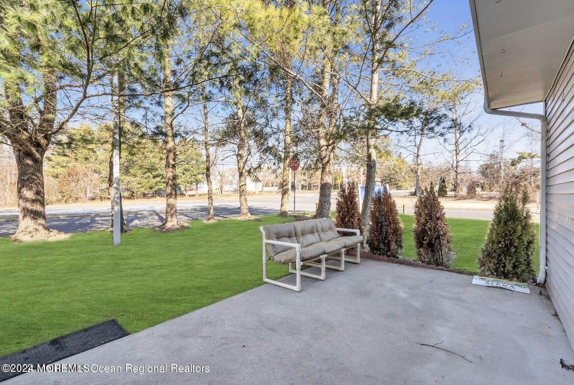 1002 Sawmill Road Brick, NJ 08724 - Photo 23 of 27 a view of a park with bench and trees