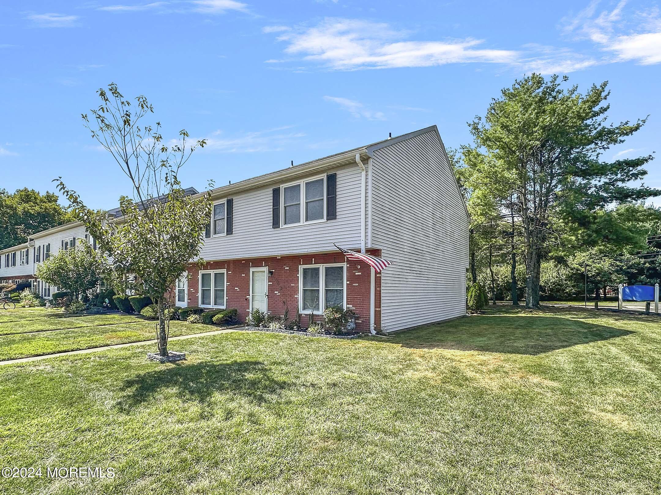 1002 Sawmill Road Brick, NJ 08724 - Photo 26 of 27 a front view of a house with a yard
