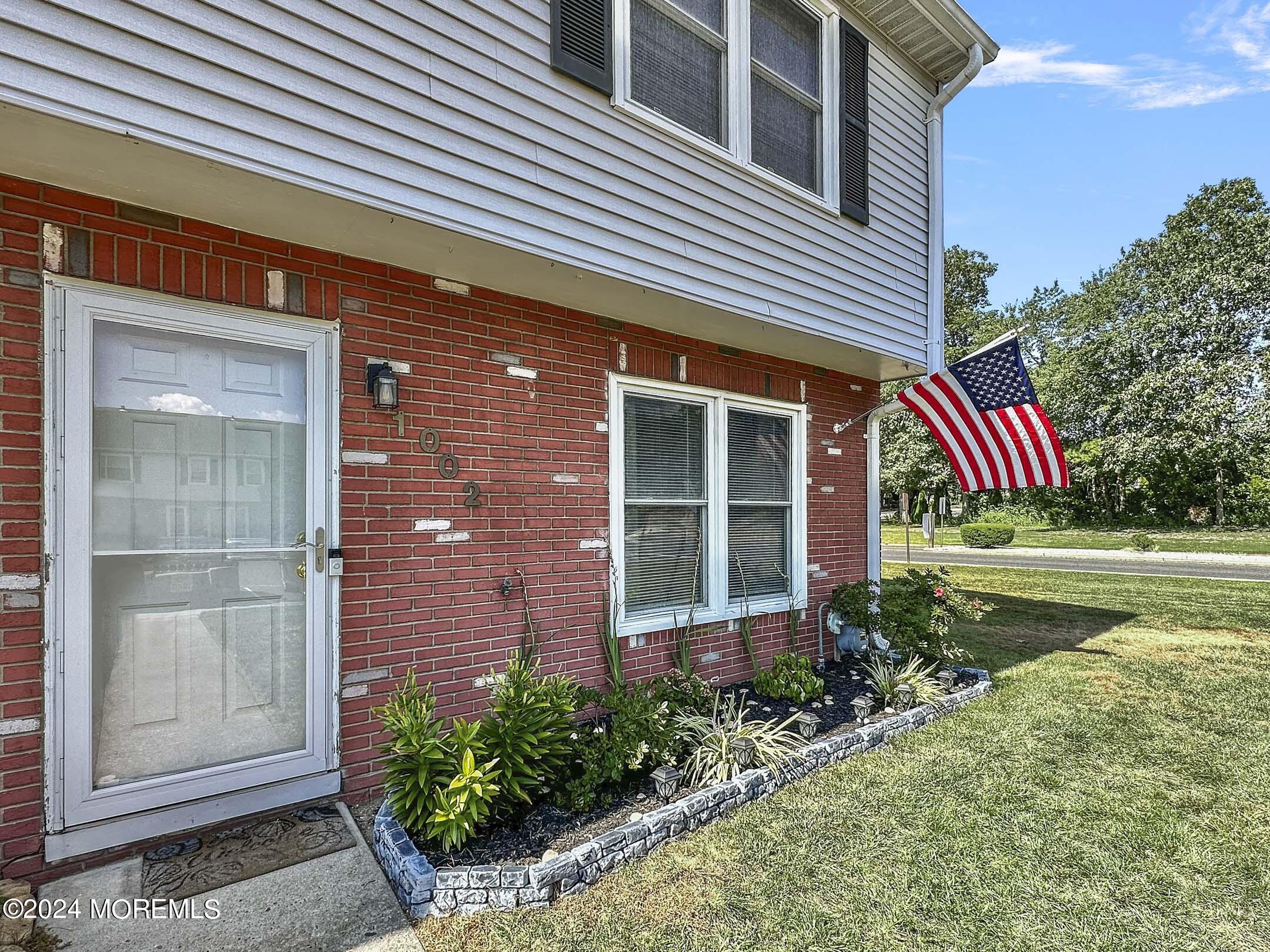 1002 Sawmill Road Brick, NJ 08724 - Photo 3 of 27 a view of a house with a yard and sitting area