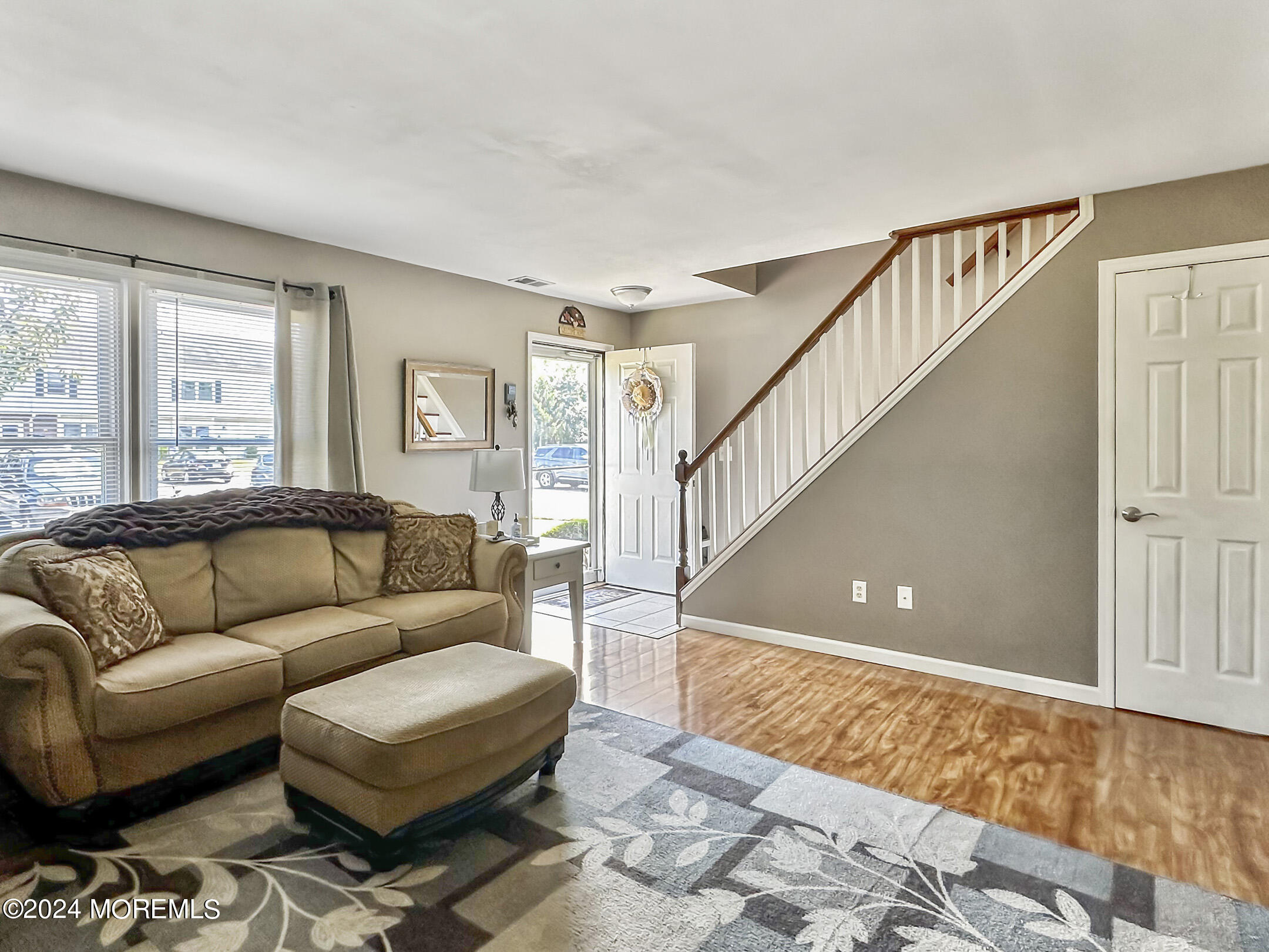 1002 Sawmill Road Brick, NJ 08724 - Photo 4 of 27 a living room with furniture and a rug