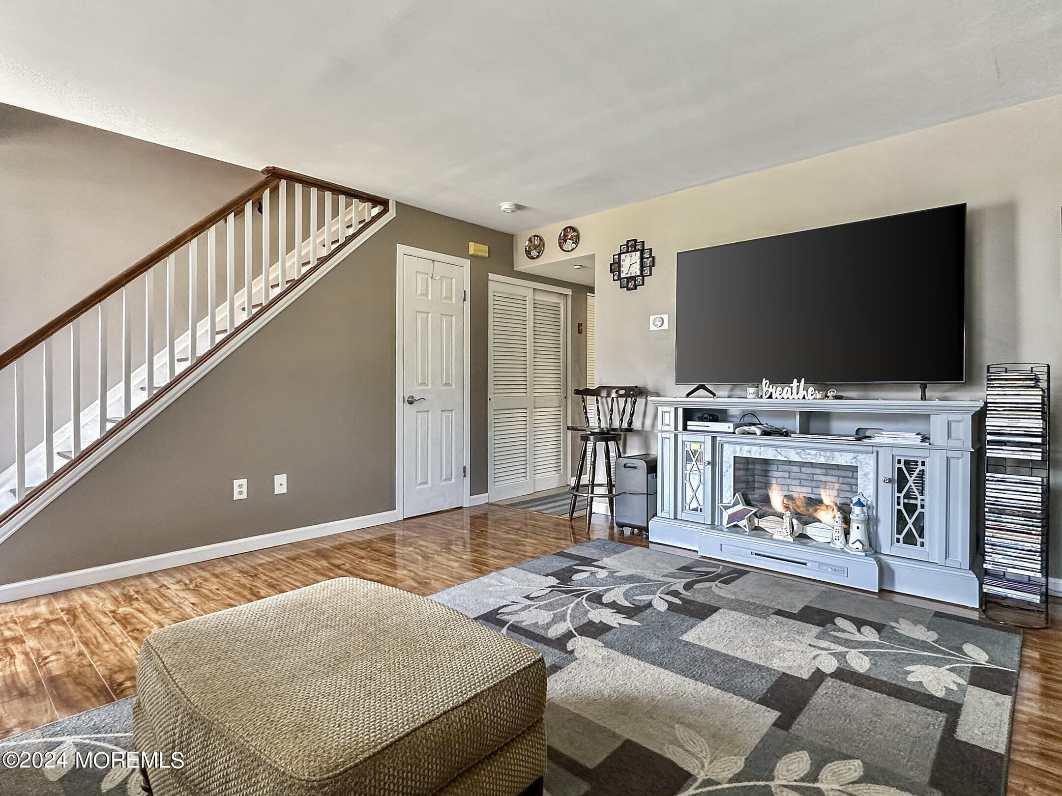 1002 Sawmill Road Brick, NJ 08724 - Photo 6 of 27 a living room with furniture and a flat screen tv