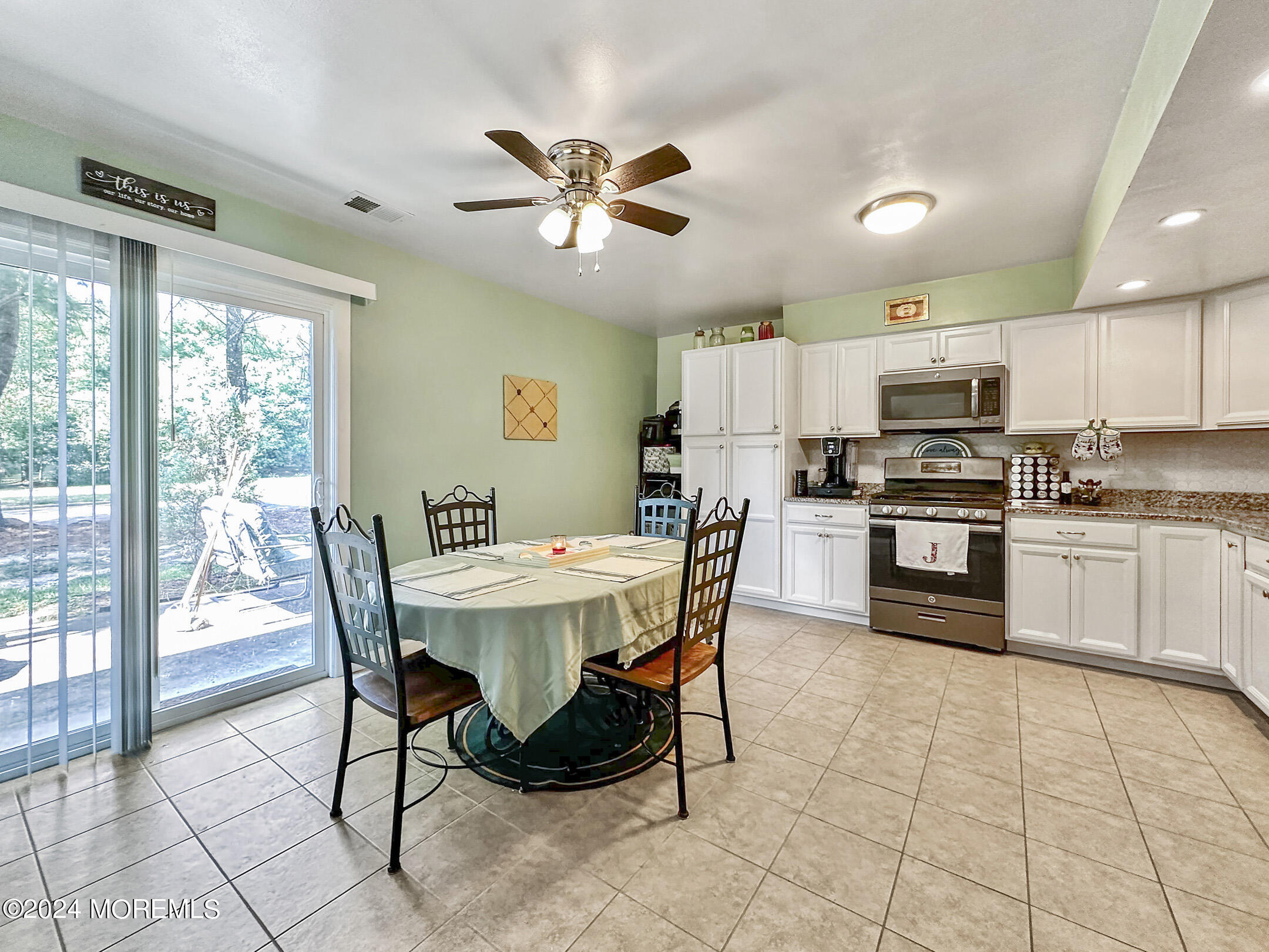 1002 Sawmill Road Brick, NJ 08724 - Photo 7 of 27 a view of a dining room with furniture window and outside view