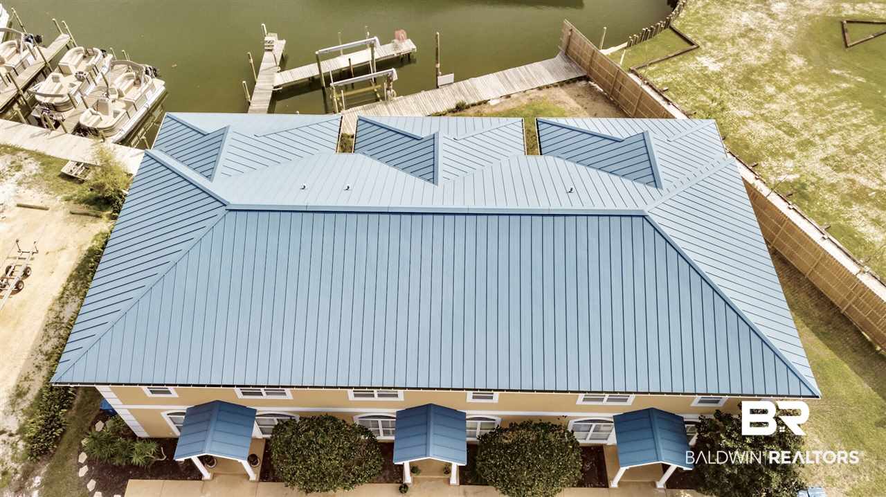 27152 Marina Road, Unit B Orange Beach, AL 36561 - Photo 2 of 37 Unit "B" is the middle unit. 2BR/2.5BA