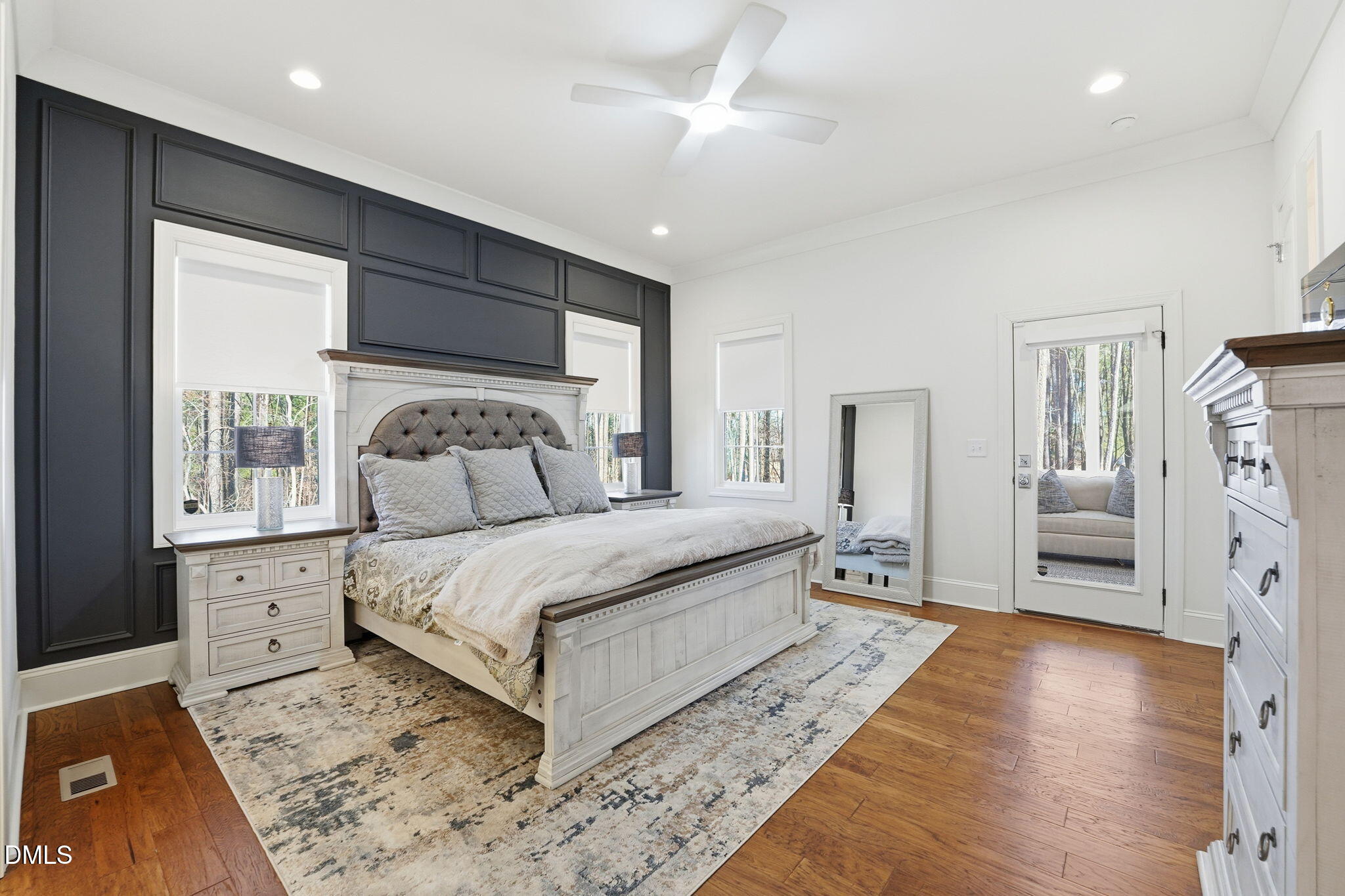 100 North Ridge View Way Franklinton, NC 27525 - Photo 8 of 25 a bedroom with a large bed and a chandelier