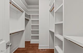 100 North Ridge View Way Franklinton, NC 27525 - Photo 10 of 25 a view of walk in closet with empty racks