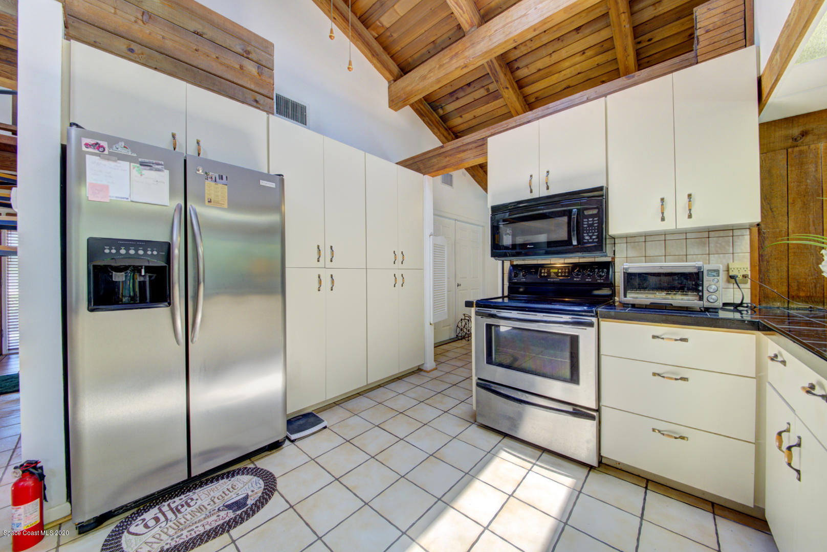 182 Sand Pine Road Indialantic, FL 32903 - Photo 12 of 56 Kitchen with Stainless Appliances