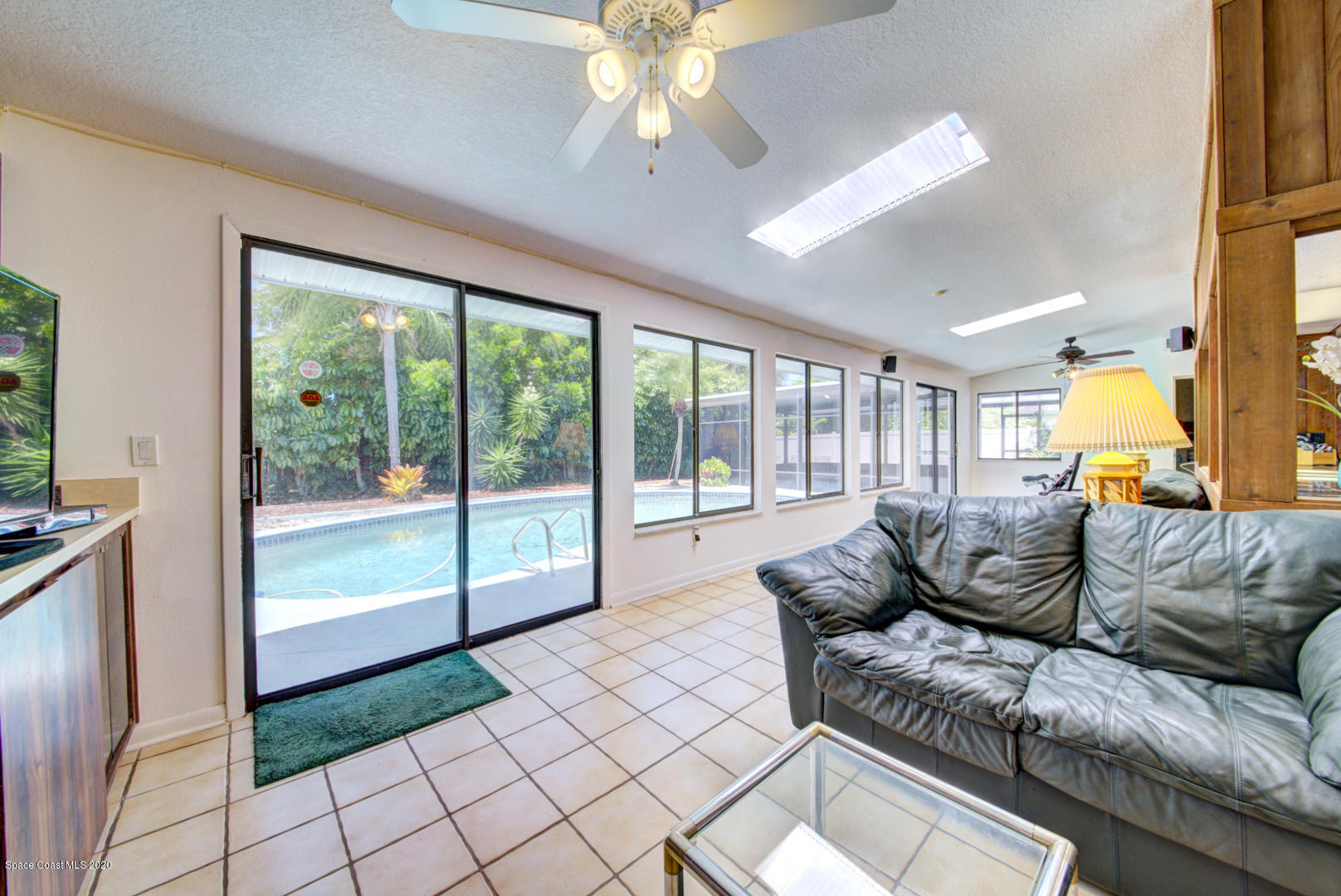 182 Sand Pine Road Indialantic, FL 32903 - Photo 25 of 56 Florida Room with Sliders to Pool