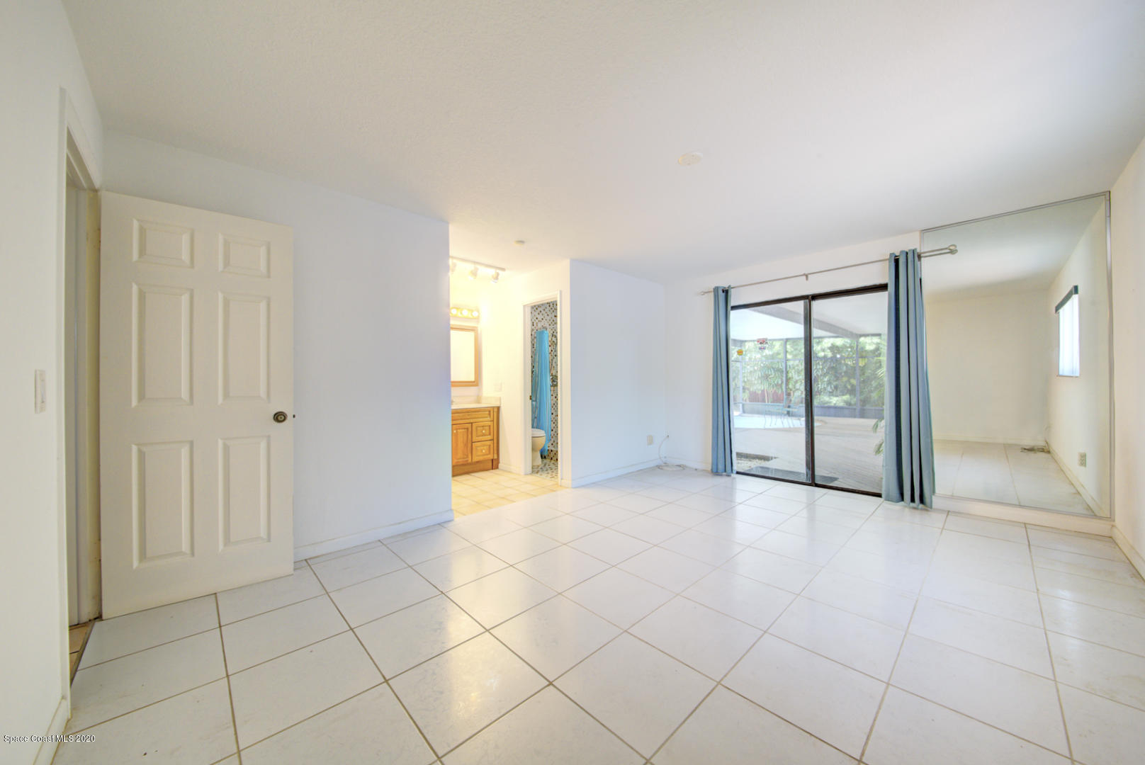 182 Sand Pine Road Indialantic, FL 32903 - Photo 35 of 56 Master Bedroom with Sliders to Porch