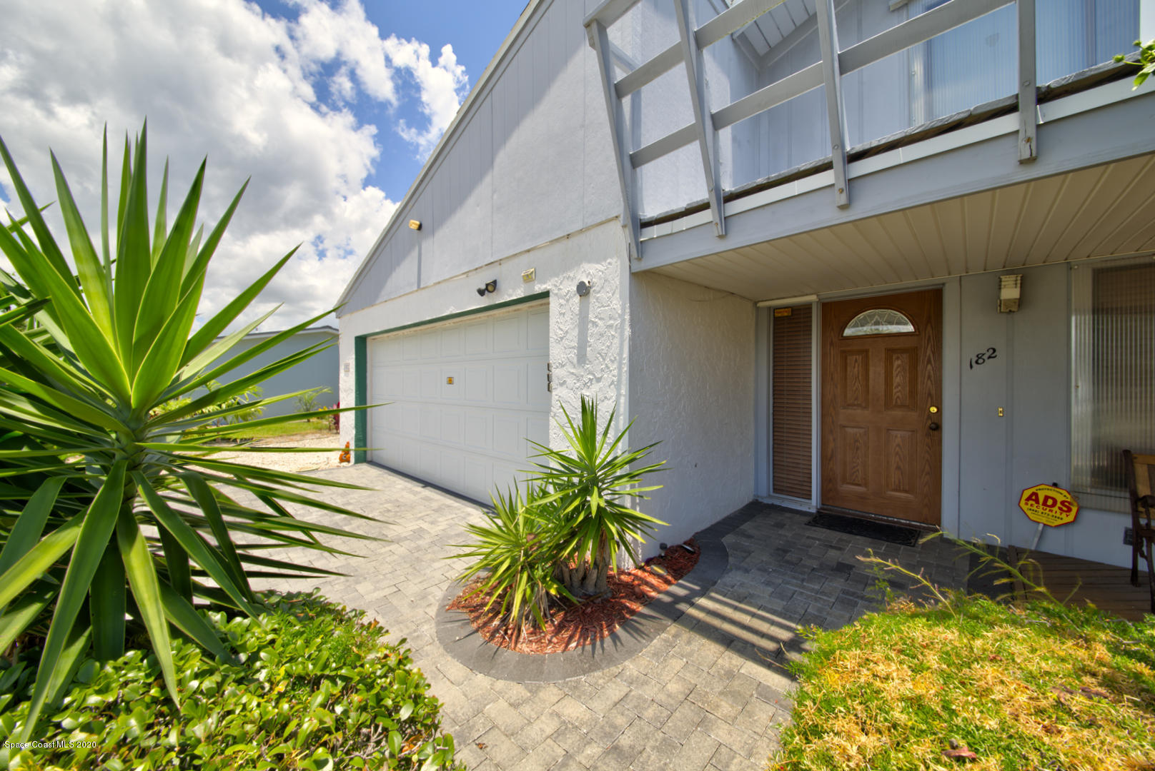 182 Sand Pine Road Indialantic, FL 32903 - Photo 5 of 56 Front Entry & Garage