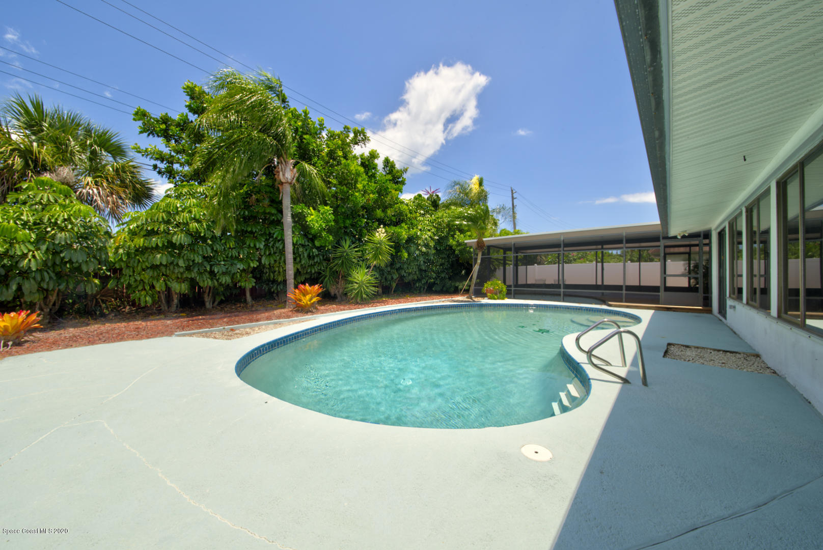 182 Sand Pine Road Indialantic, FL 32903 - Photo 48 of 56 Pool Area & Screened Porch