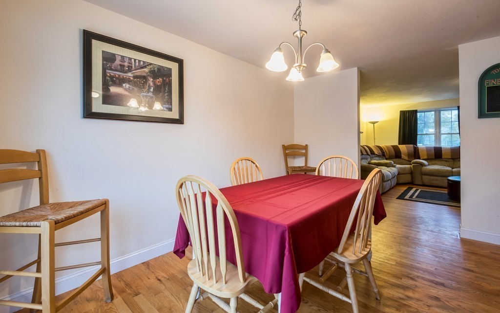 263 Forest Street Methuen, MA 01844 - Photo 6 of 18 a dining room with furniture and wooden floor