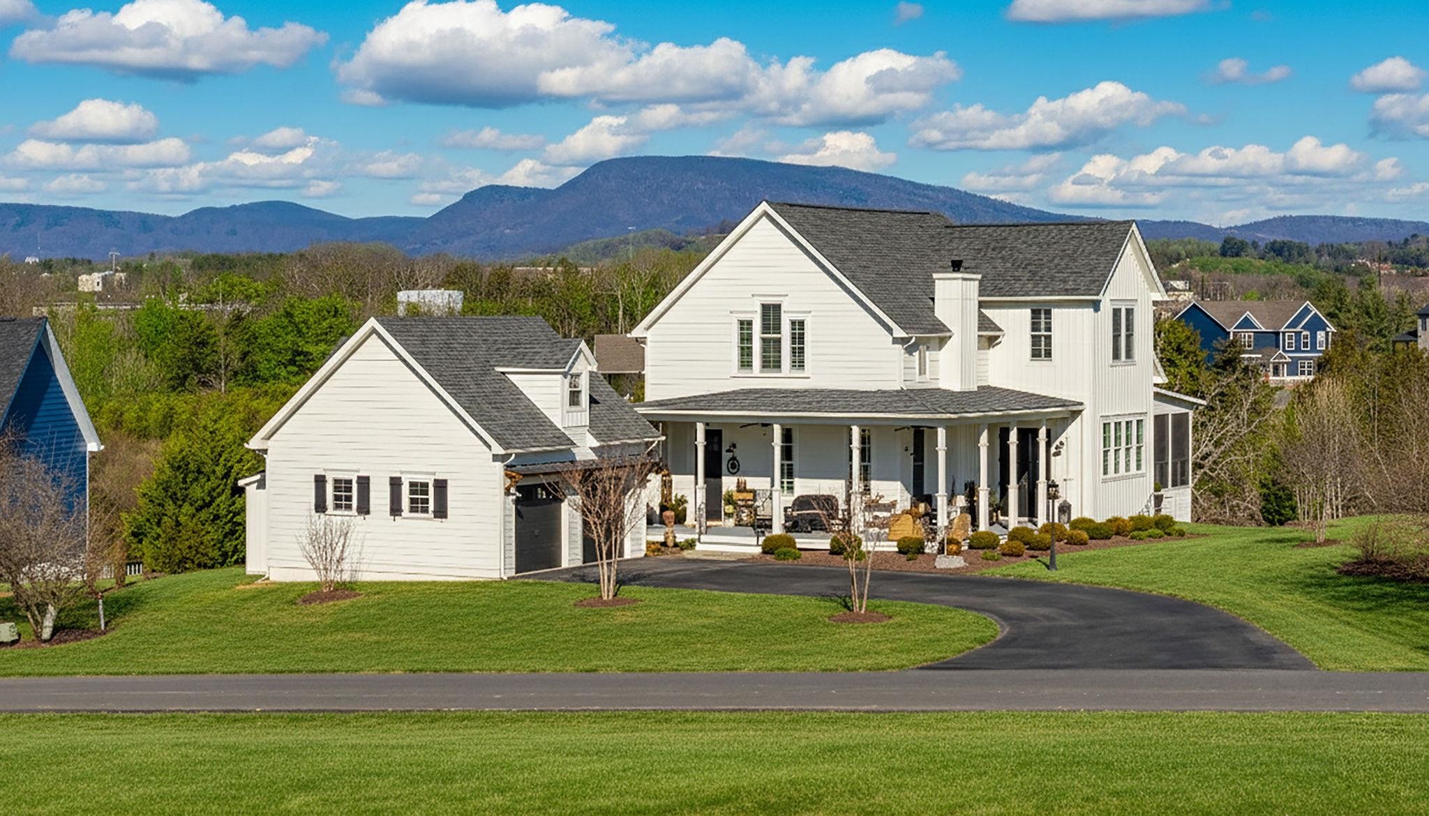 10 Cora Lane Lexington, VA 24450 - Photo 3 of 74 a front view of a house with a garden