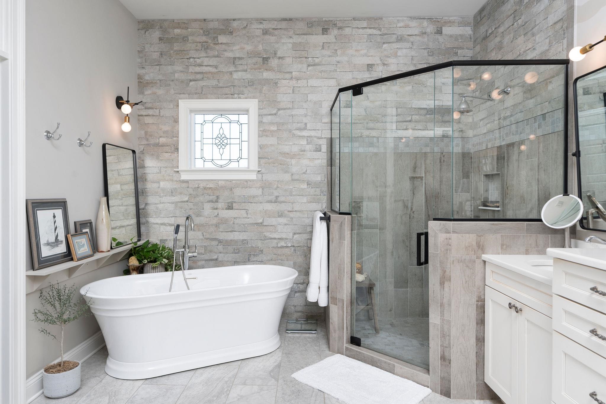 10 Cora Lane Lexington, VA 24450 - Photo 31 of 74 a bathroom with a white bath tub a mirror and a shower