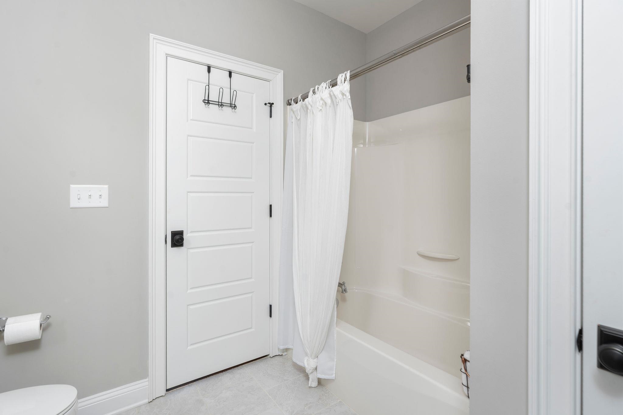 10 Cora Lane Lexington, VA 24450 - Photo 47 of 74 a bathroom with a shower and a toilet