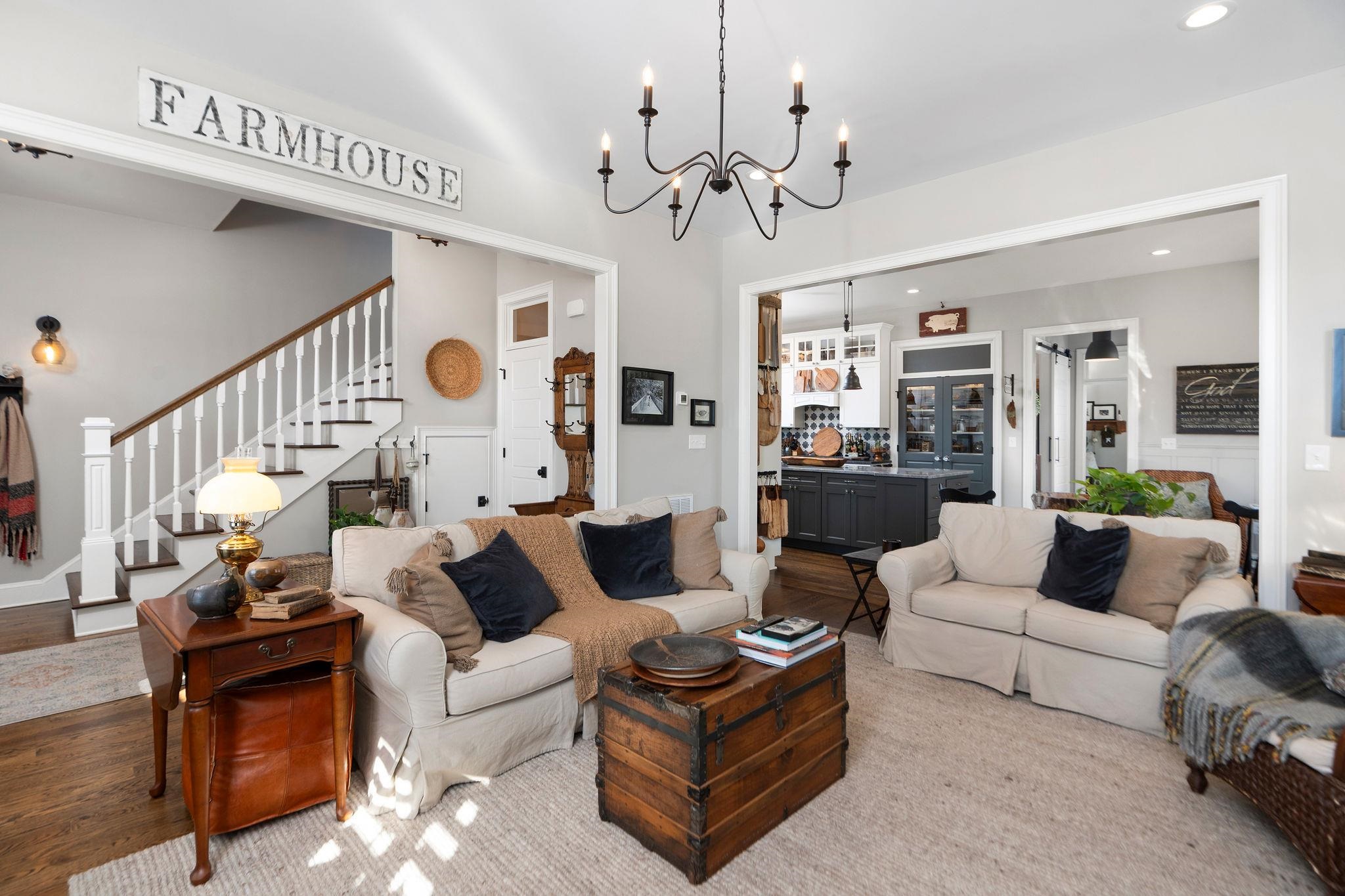 10 Cora Lane Lexington, VA 24450 - Photo 6 of 74 a living room with furniture kitchen view and a chandelier