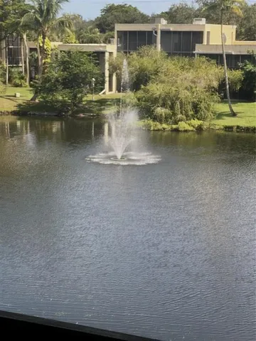 a view of a lake with a house