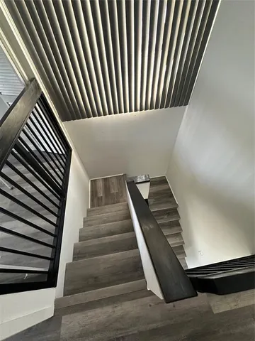 a bathroom with a tub and shower