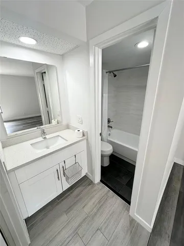 a bathroom with a sink and a bathtub
