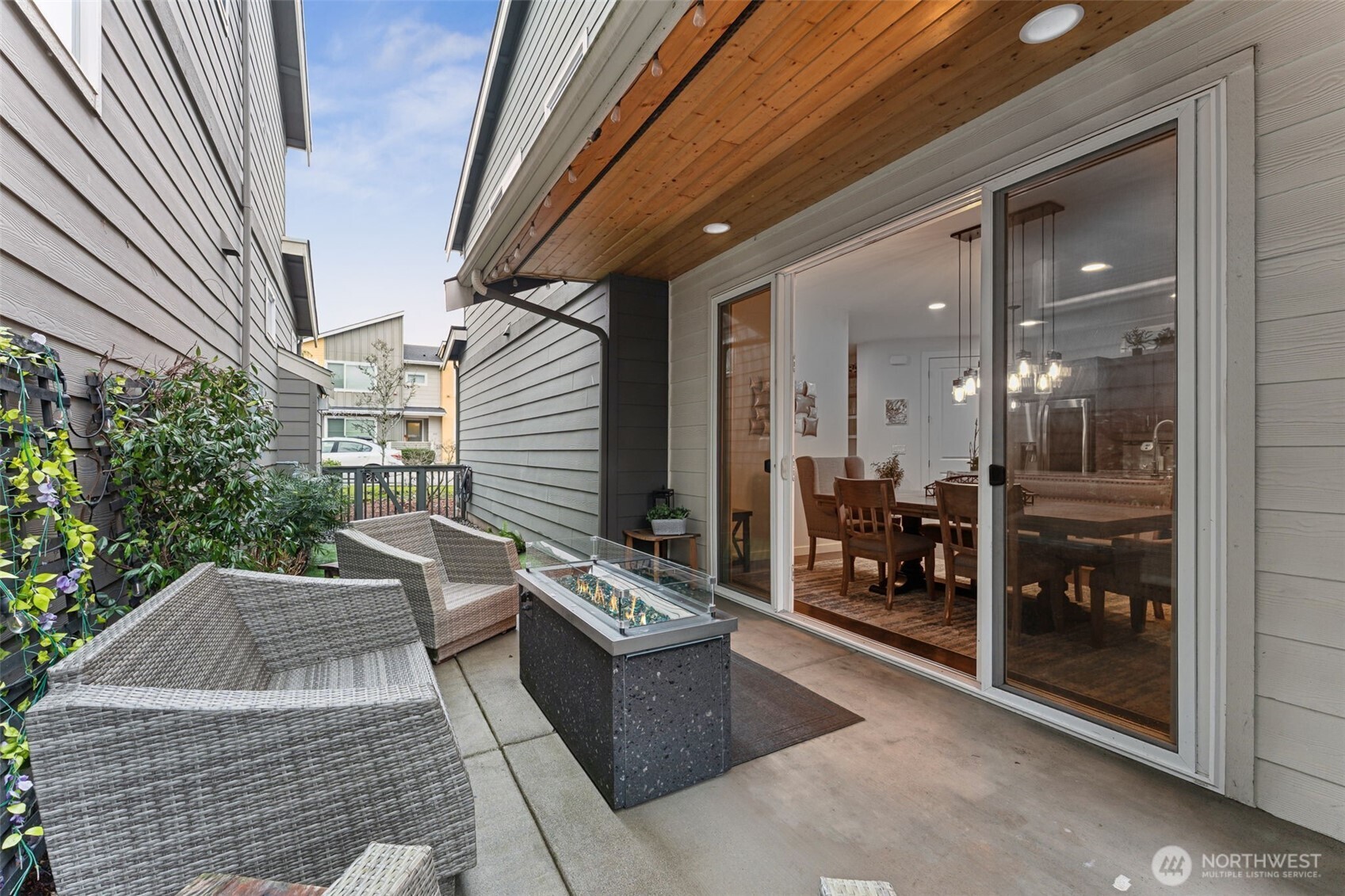 845 Southwest 96th Place Seattle, WA 98106 - Photo 11 of 24 a building outdoor space with patio furniture and potted plants