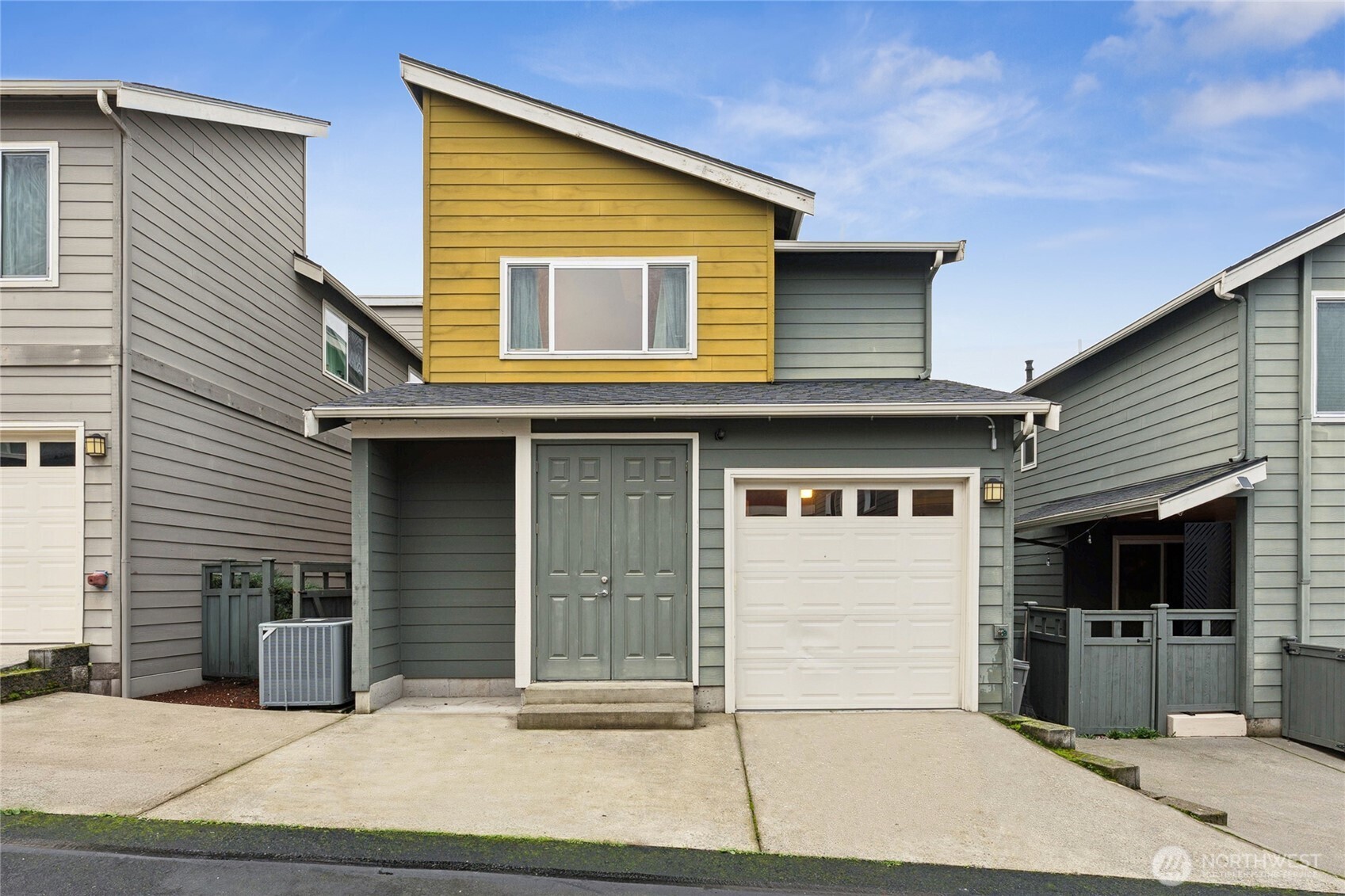 845 Southwest 96th Place Seattle, WA 98106 - Photo 24 of 24 a front view of a house with garage