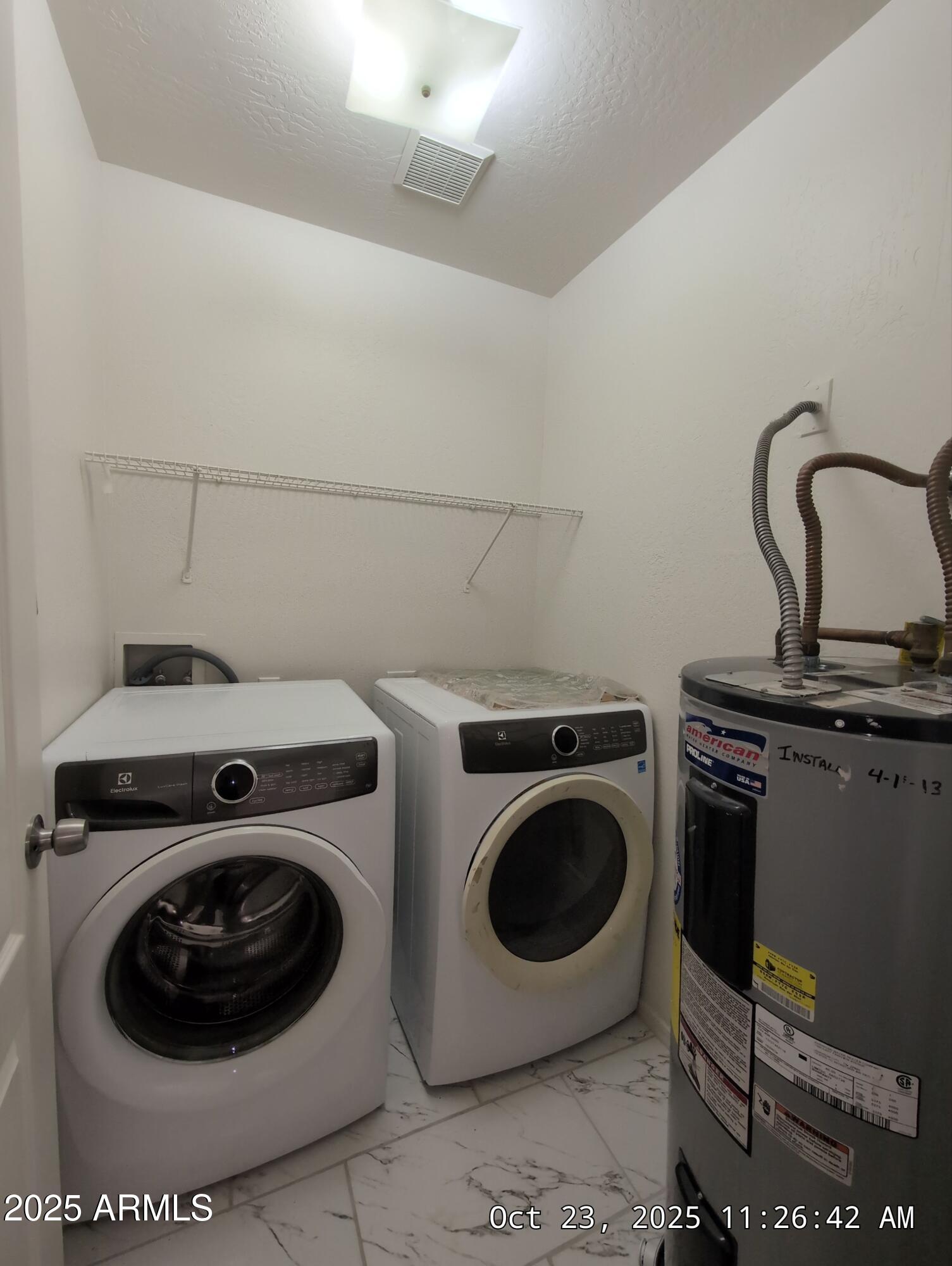9978 West Century Drive, Unit B Arizona City, AZ 85123 - Photo 11 of 11 a utility room with dryer and washer