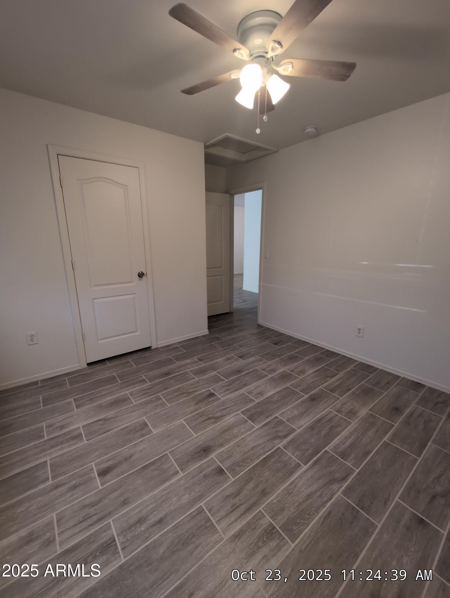 9978 West Century Drive, Unit B Arizona City, AZ 85123 - Photo 8 of 11 a view of an empty room with a window